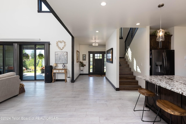 entryway with light hardwood / wood-style flooring