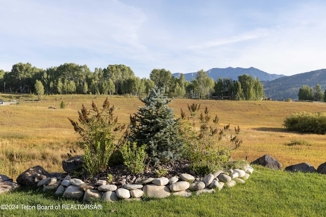 property view of mountains featuring a rural view