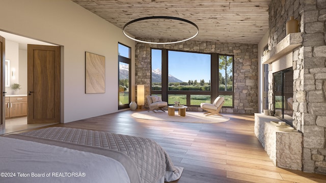 unfurnished bedroom featuring wooden ceiling, connected bathroom, and light hardwood / wood-style floors