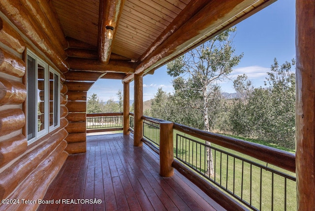 wooden terrace featuring french doors