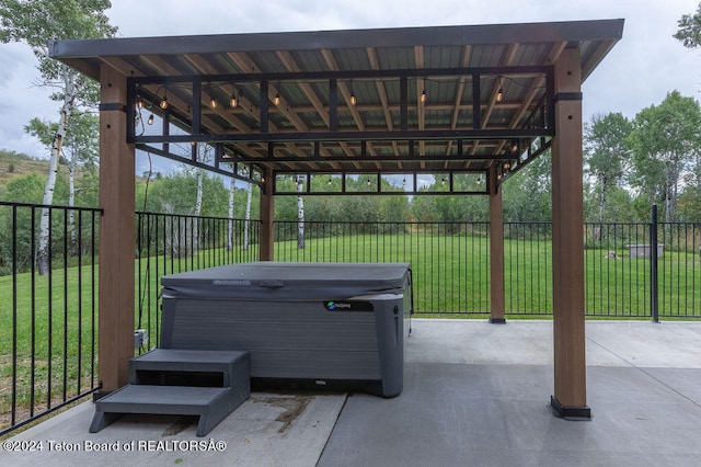 view of patio with a gazebo and a hot tub