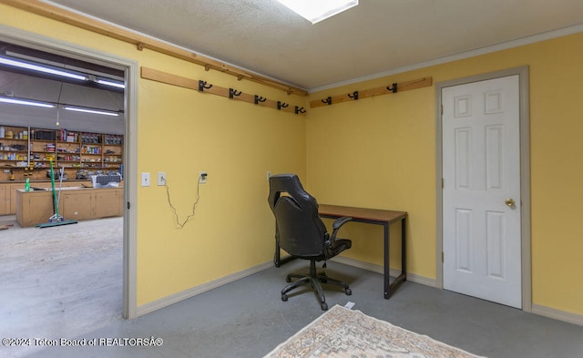 office area featuring concrete flooring