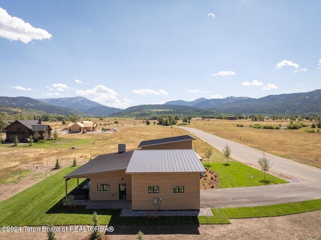 property view of mountains featuring a rural view