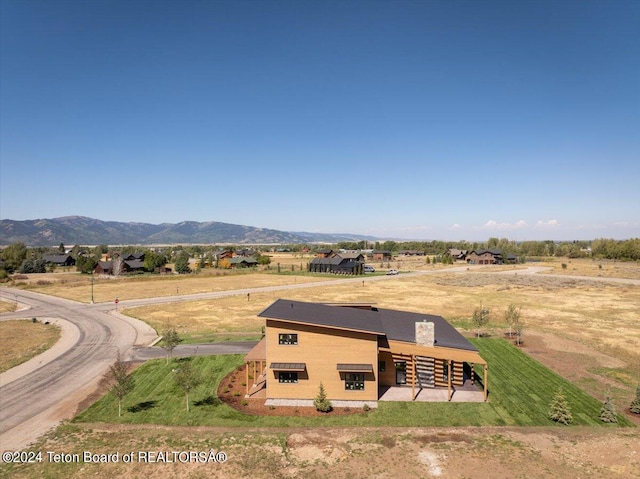 drone / aerial view featuring a mountain view