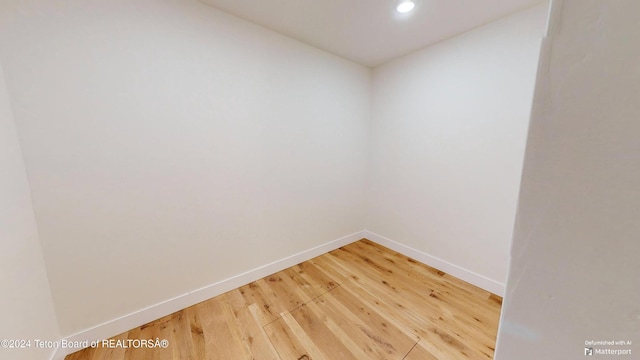 unfurnished room featuring wood-type flooring