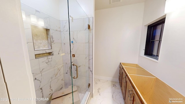 bathroom with vanity and an enclosed shower