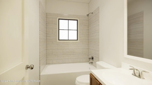 full bathroom featuring vanity, toilet, and tiled shower / bath