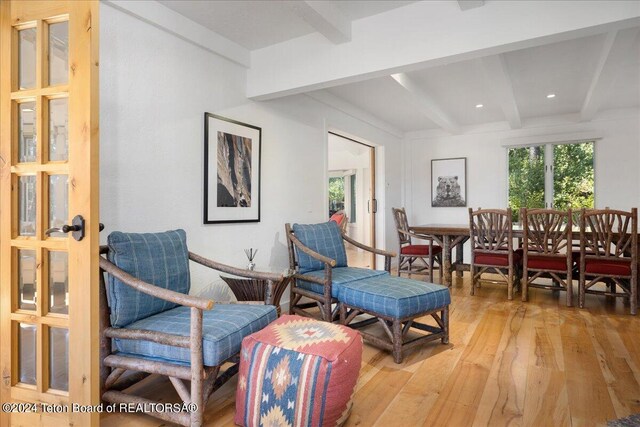 3705 W Mccollister Dr, Teton Village, WY 83025 - sitting room with light wood-style floors and beam ceiling