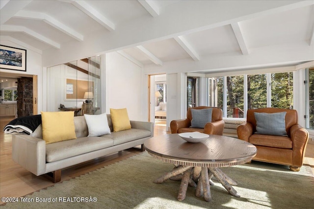 3705 W Mccollister Dr, Teton Village, WY 83025 - living room with vaulted ceiling with beams and wood finished floors