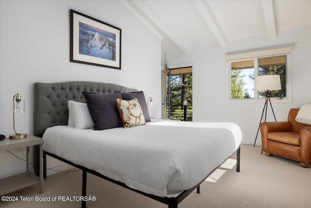 3705 W Mccollister Dr, Teton Village, WY 83025 - bedroom with carpet flooring, access to outside, and beamed ceiling