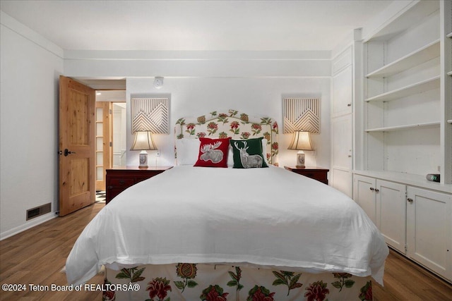3705 W Mccollister Dr, Teton Village, WY 83025 - bedroom with wood finished floors and visible vents