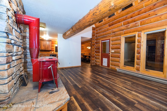 wooden terrace featuring a baseboard heating unit and a patio