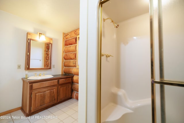 full bath featuring a shower, log walls, and vanity