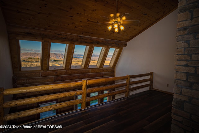 interior space featuring hardwood / wood-style floors, high vaulted ceiling, and plenty of natural light