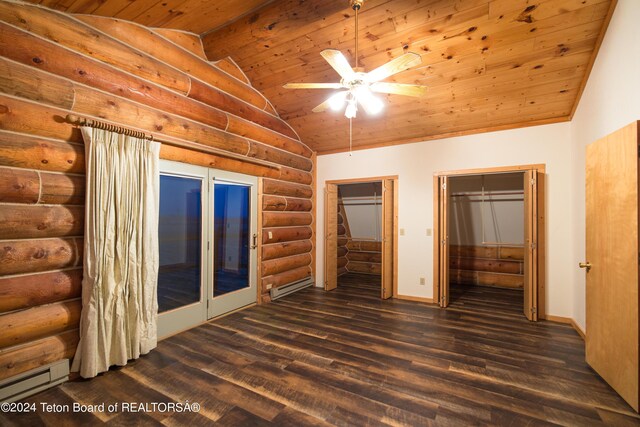 unfurnished bedroom with wooden ceiling, dark wood-type flooring, multiple closets, lofted ceiling with beams, and baseboard heating