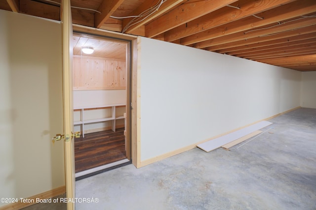 finished basement featuring baseboards