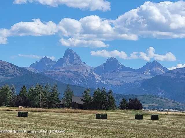 property view of mountains featuring a rural view