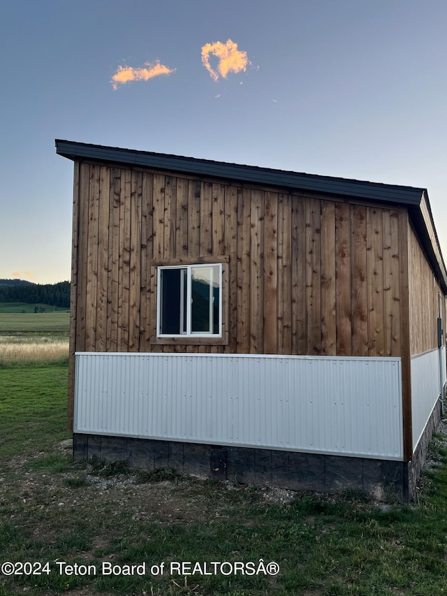 view of property exterior at dusk