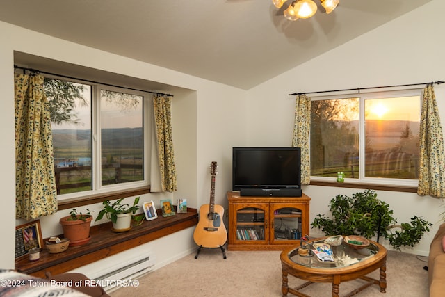 living room featuring vaulted ceiling and carpet floors