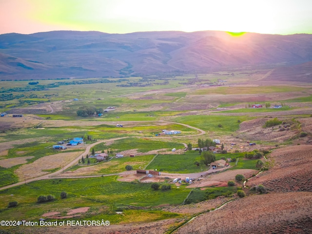 property view of mountains featuring a rural view