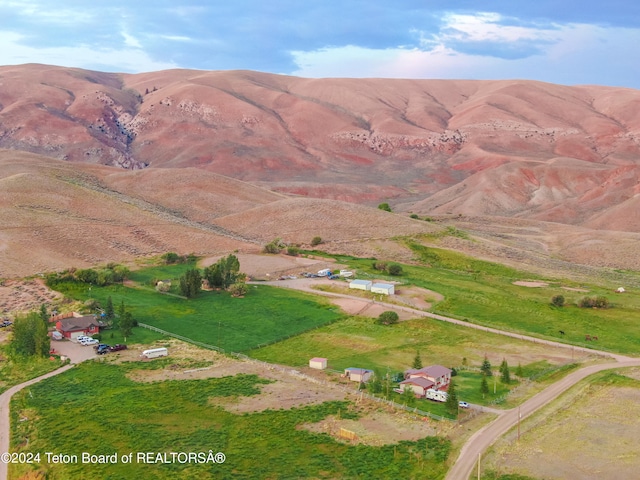 property view of mountains featuring a rural view