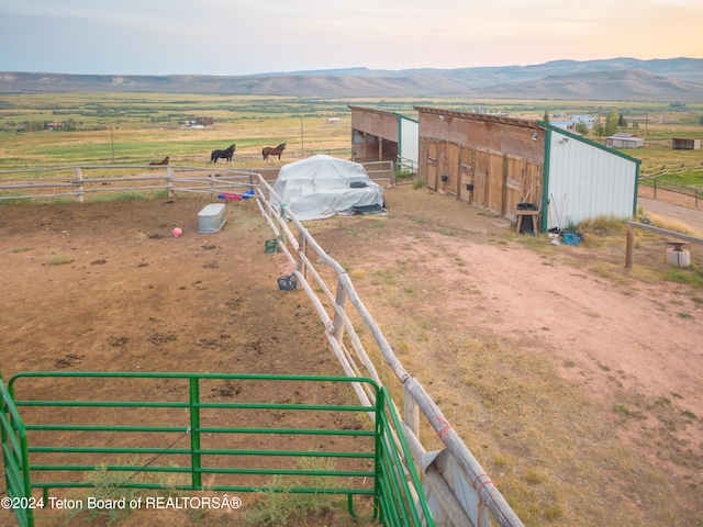 exterior space featuring a mountain view and a rural view