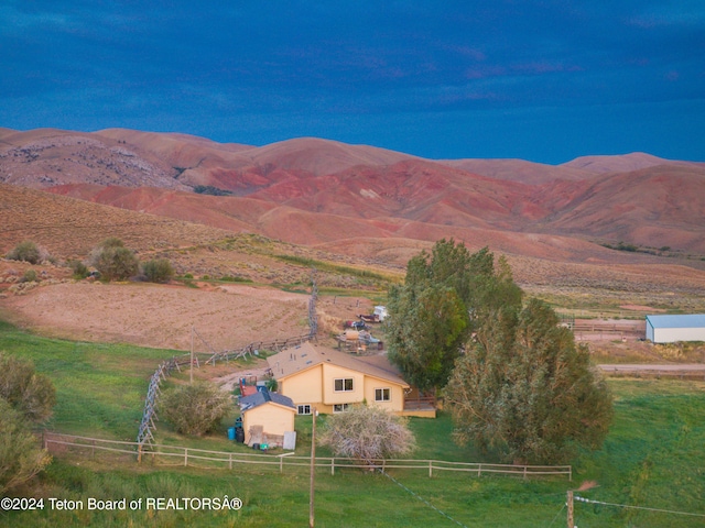 property view of mountains featuring a rural view