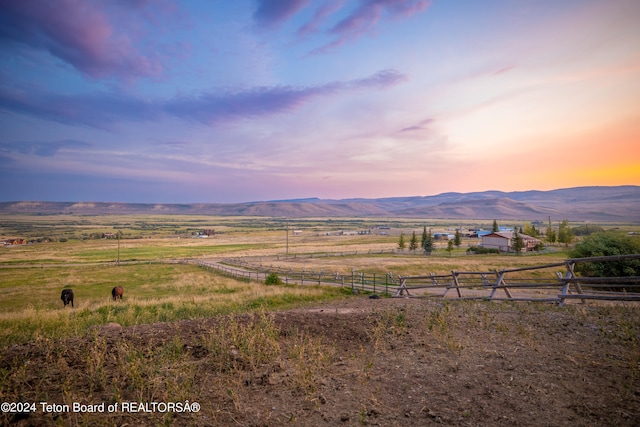 property view of mountains featuring a rural view