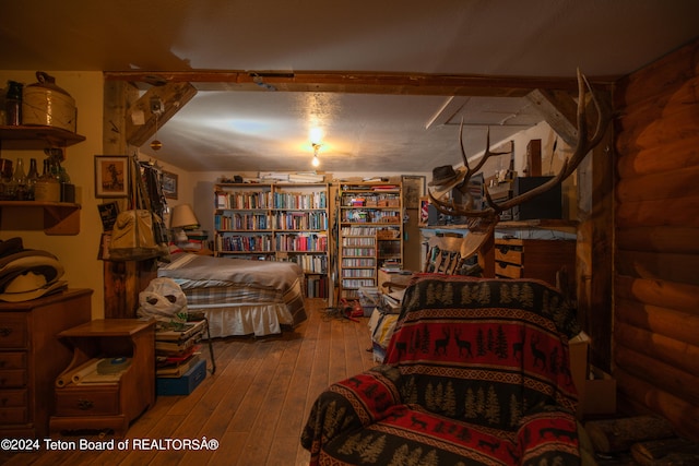 bedroom featuring hardwood / wood-style floors