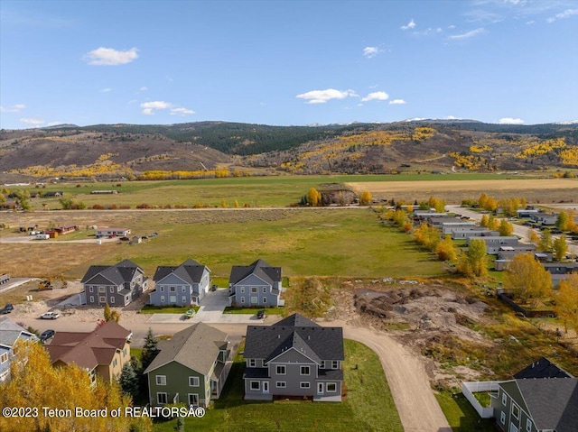 bird's eye view with a mountain view