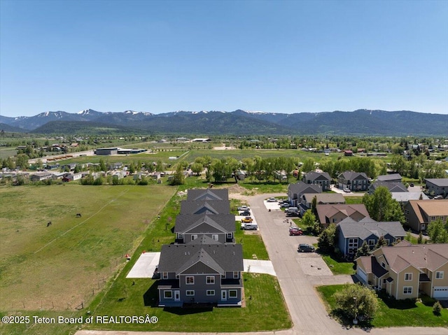 90 Alpine Trl Unit 31, Victor, ID 83455 - aerial perspective of suburban area featuring a mountain backdrop