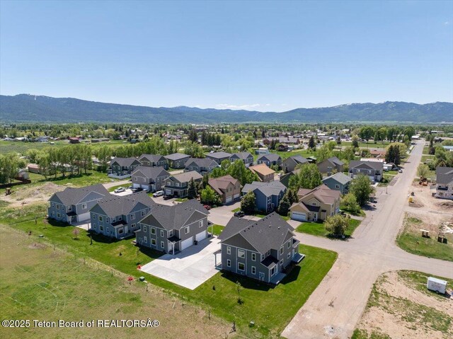 90 Alpine Trl Unit 31, Victor, ID 83455 - aerial view of residential area featuring a mountainous background