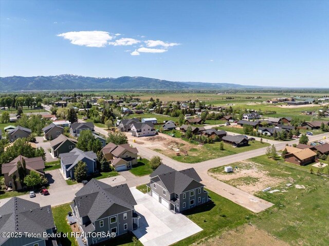 90 Alpine Trl Unit 31, Victor, ID 83455 - aerial view of residential area with a mountainous background