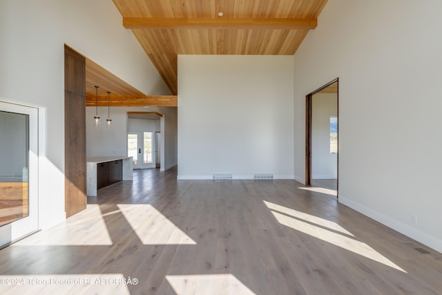 unfurnished living room featuring wood ceiling, beam ceiling, high vaulted ceiling, and hardwood / wood-style flooring