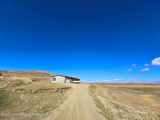 view of road with a rural view