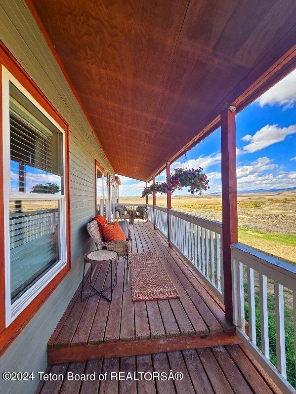 wooden deck with a porch