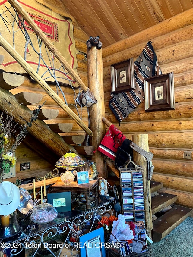 interior details with wooden ceiling and log walls