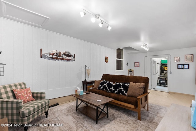 living room featuring wooden walls