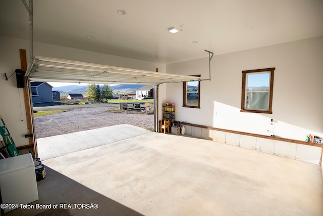 garage featuring a mountain view