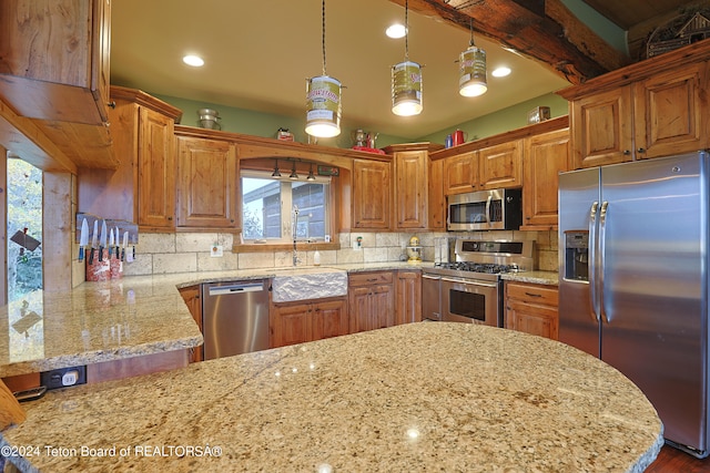 4120 W 9500 N, Tetonia, ID 83452 - kitchen with tasteful backsplash, light stone countertops, stainless steel appliances, pendant lighting, and beam ceiling
