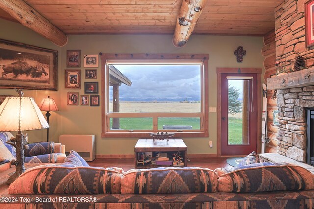 4120 W 9500 N, Tetonia, ID 83452 - living room featuring beam ceiling, wooden ceiling, and a wealth of natural light