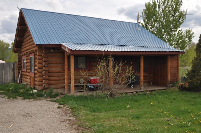 view of property exterior with a yard