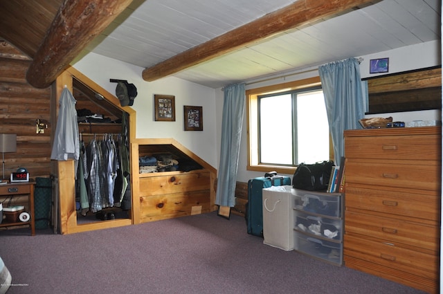 bedroom featuring vaulted ceiling with beams, wood ceiling, carpet, and a closet