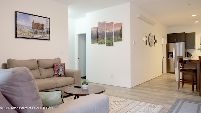 living room with light hardwood / wood-style floors