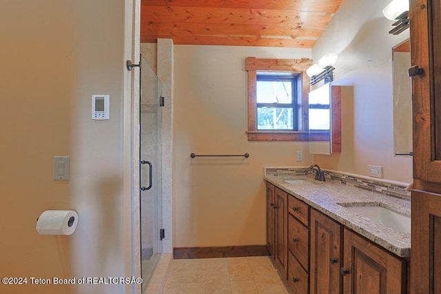 bathroom featuring an enclosed shower, wooden ceiling, tile patterned floors, and vanity