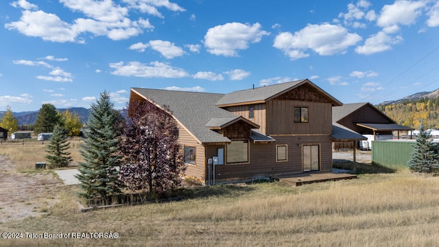 view of front of home with a mountain view