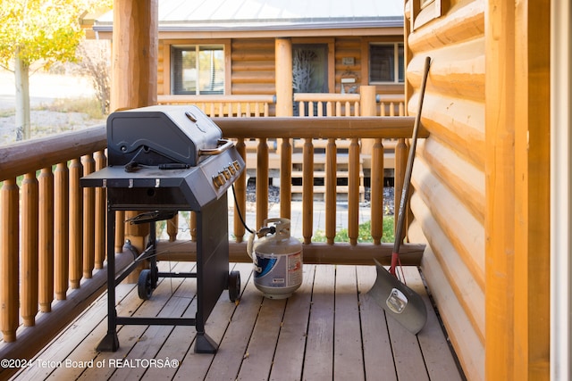 wooden terrace with grilling area