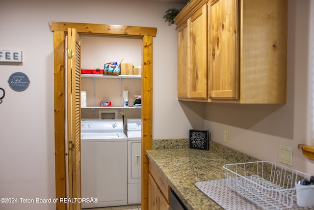 laundry room featuring washing machine and dryer