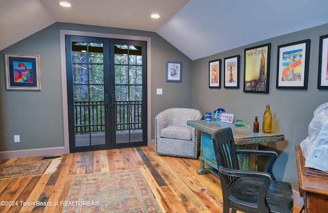 office area featuring hardwood / wood-style flooring and lofted ceiling