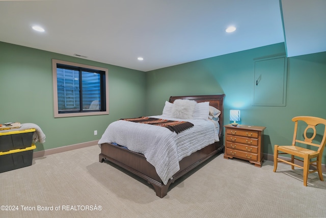 bedroom with light carpet